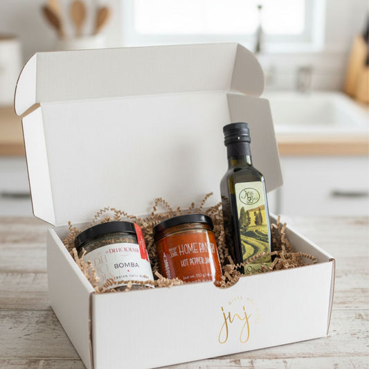 The chef's kiss food gift basket, a set with olive oil, hot pepper, cooking spice jar. Gourmet Food Gift Box