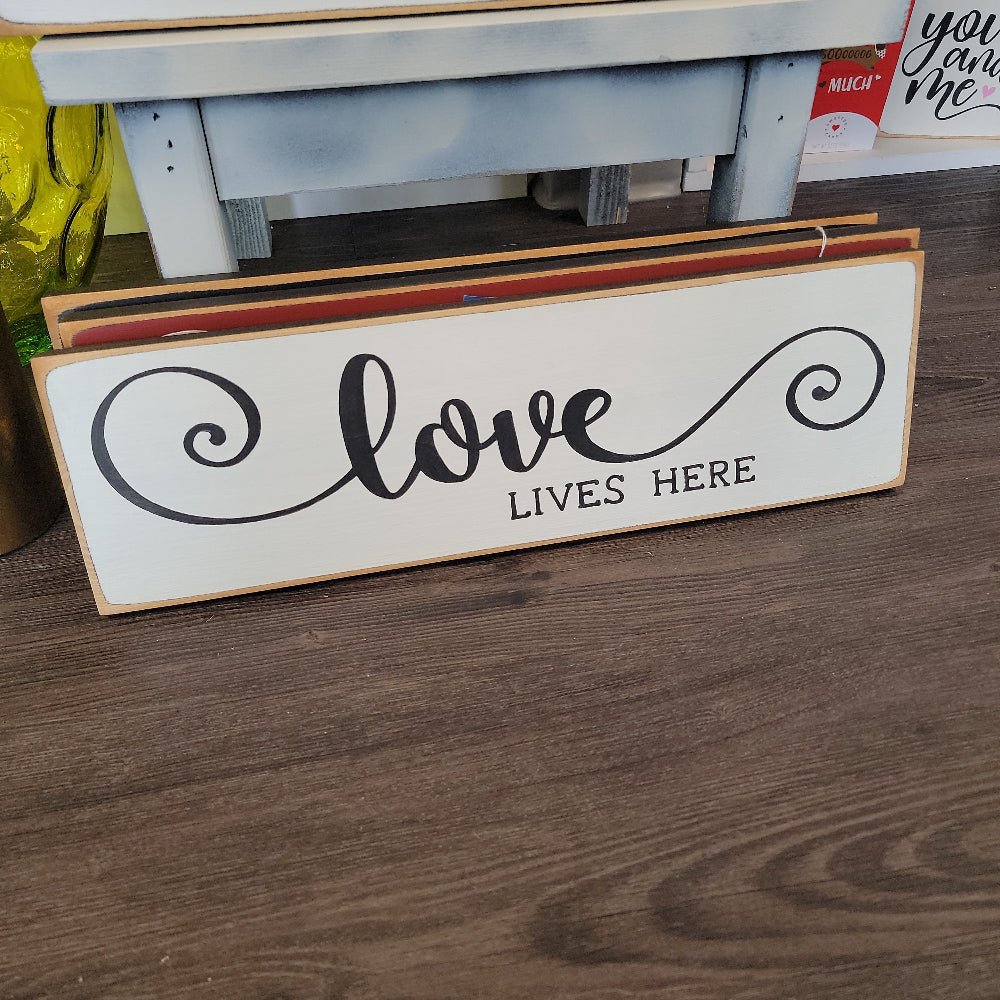 love lives here wooden sign handmade in wisconsin