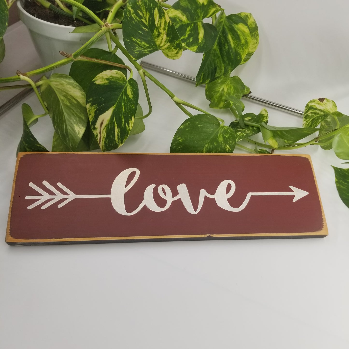 Love arrow wooden sign