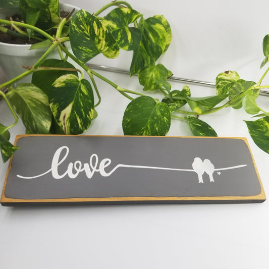 Love with two birds sign