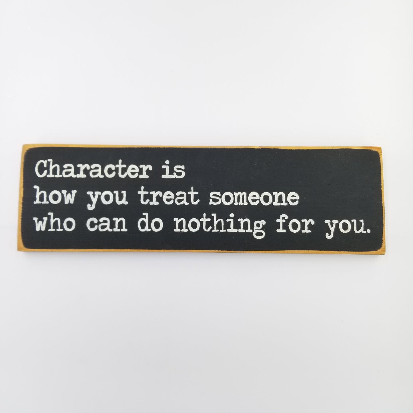 Character is how you treat someone who can do nothing for you Wooden Sign