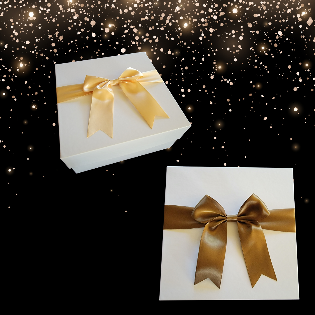 empty gift box with crinkle paper and ribbon