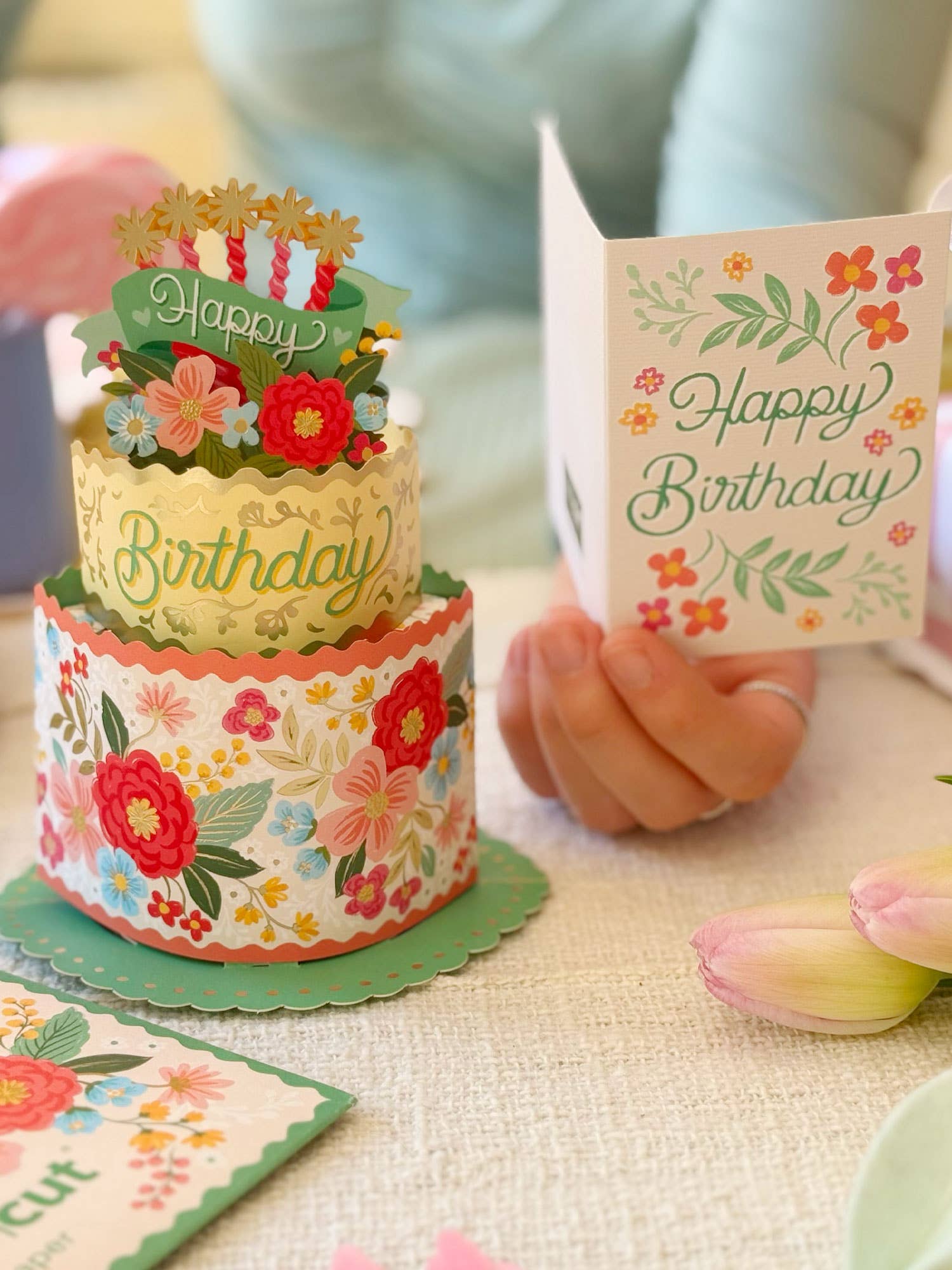 Blooming Birthday Cake Mini Pop-up Greeting Card, perfect for birthday gifts and curated gift boxes (lifestyle photo)