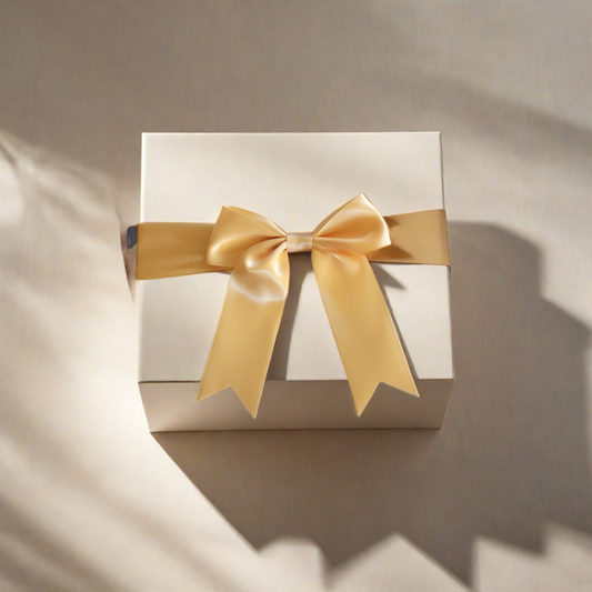white gift box with paper and ribbon