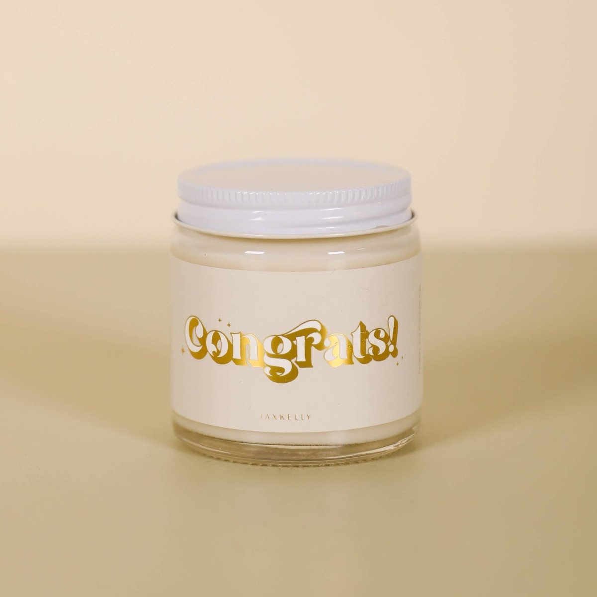 Congrats Candles - 4oz — hand-poured scented candle, perfect for curated gift boxes and Build a Box gifting (lifestyle photo)