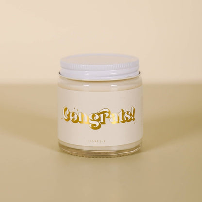 Congrats Candles - 4oz — hand-poured scented candle, perfect for curated gift boxes and Build a Box gifting (lifestyle photo)