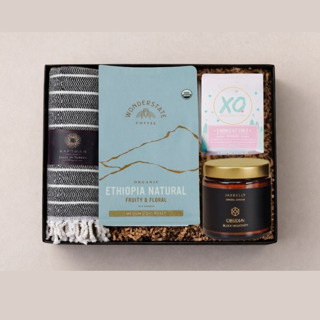 blanket, smores kit, candle as care package and hug in a box