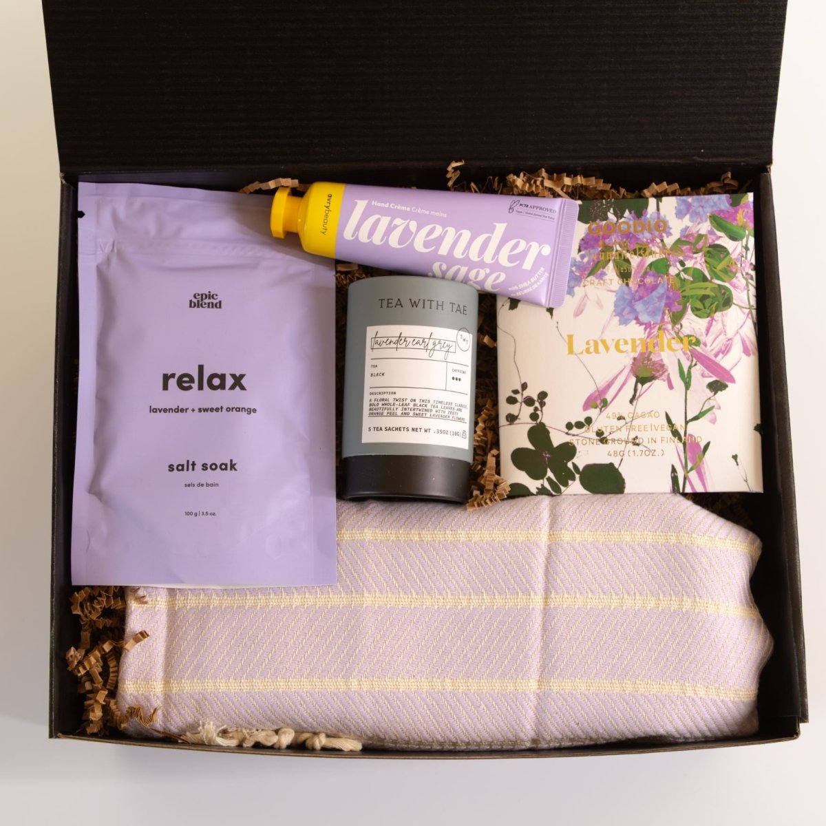 The Lavender Healing Gift Box combines spa essentials, tea, chocolate, and a cozy blanket, making it a thoughtful choice for recovery, stress relief, self-care gifting, and everyday comfort for sympathy