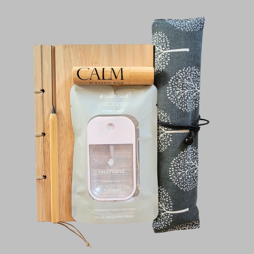 Sustainable Office Essentials Gift box with Noshinku eucalyptus hand sanitizer, bamboo notebook, calm roll-on, never ending pencil, and travel cutlery set