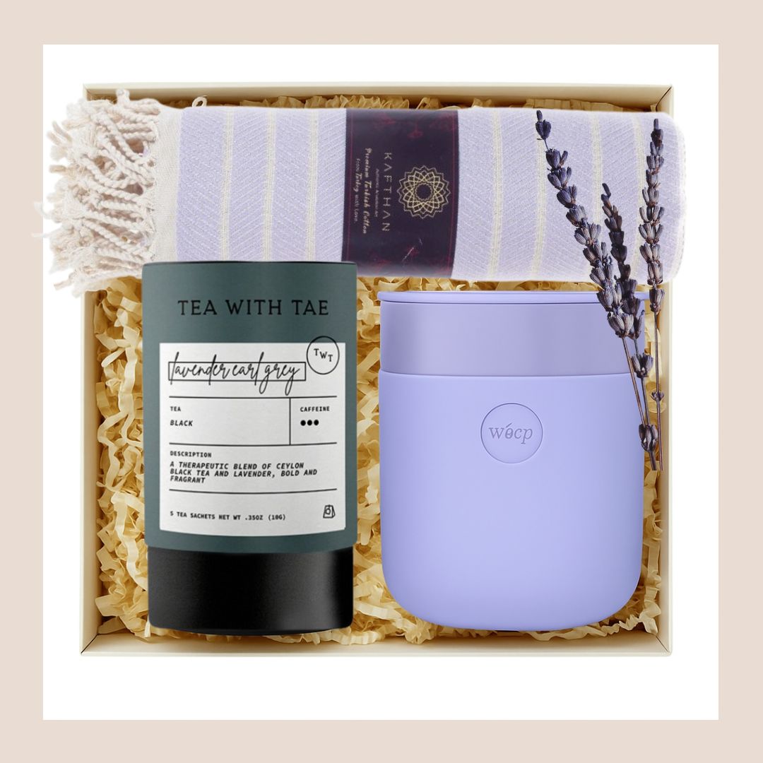 Gift set with lavender tea, purple tumbler, and blanket in a box