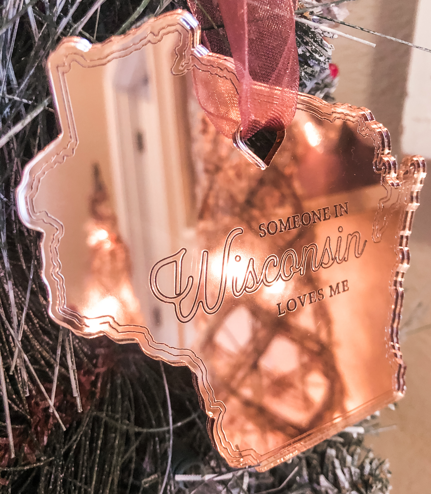 Someone  in Wisconsin loves me rose gold ornament