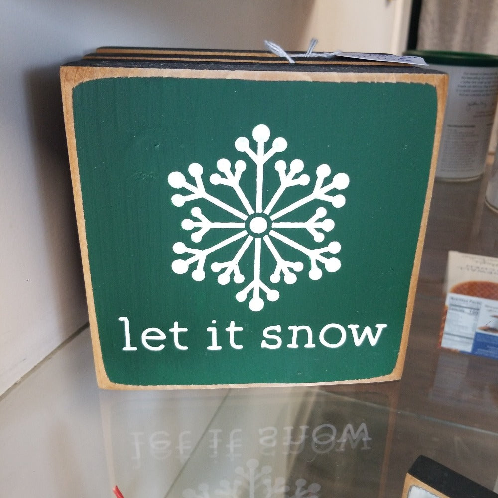 green let it snow wooden sign