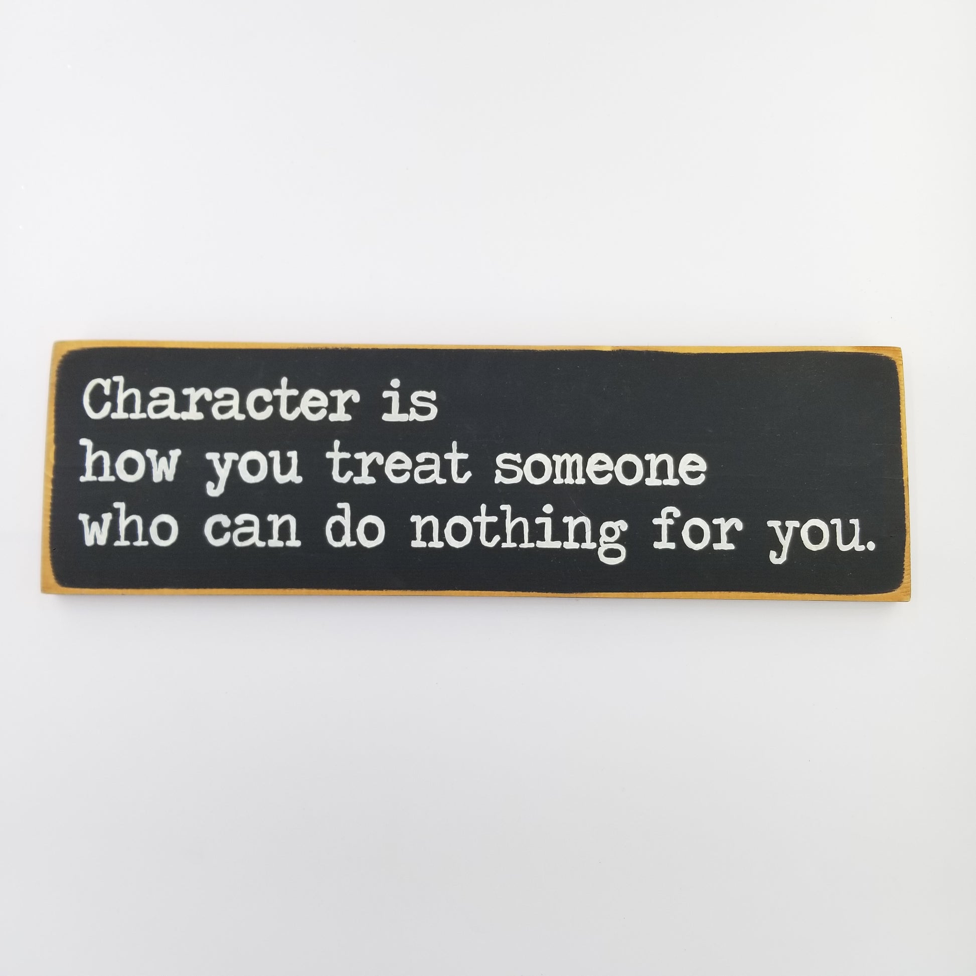 Character is how you treat someone who can do nothing for you Wooden Sign